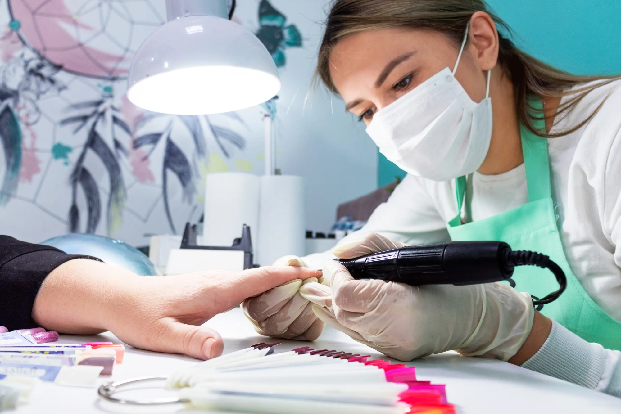 woman-performing-manicure-service-in-beauty-salon-2026-03-17-17-45-12-utc